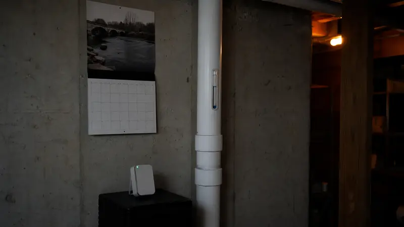 Calendar on a basement wall above a radon monitor